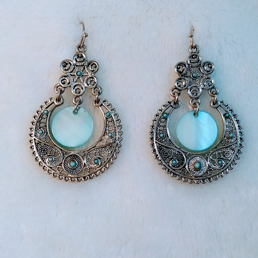 Silver  costume jewelry dangle earrings